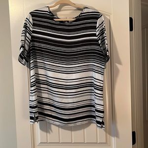 Striped polyester short sleeve top size X-large with button closure.
